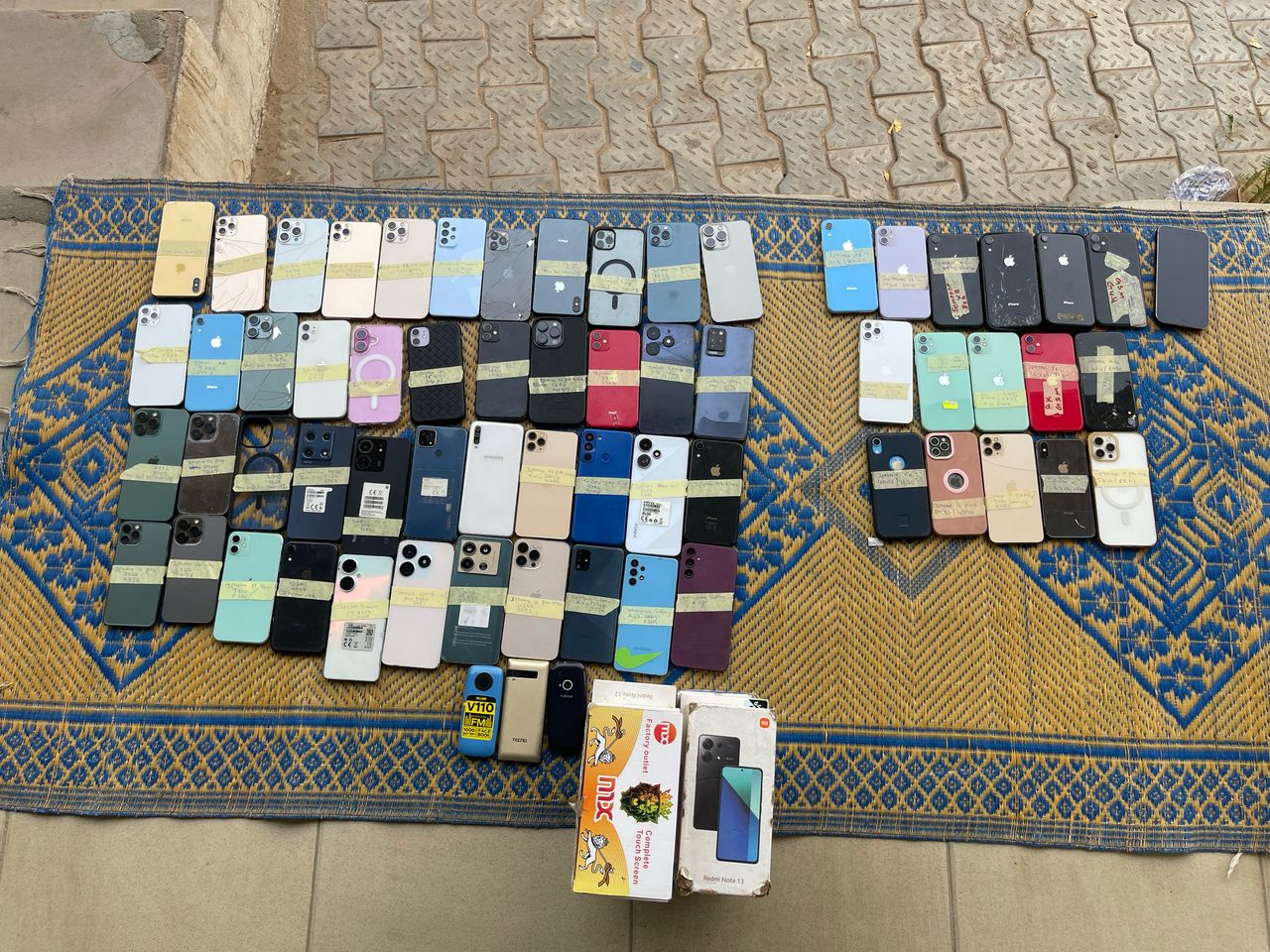 PHOTOS: Police arrest two with stolen phones worth N35m in Borno